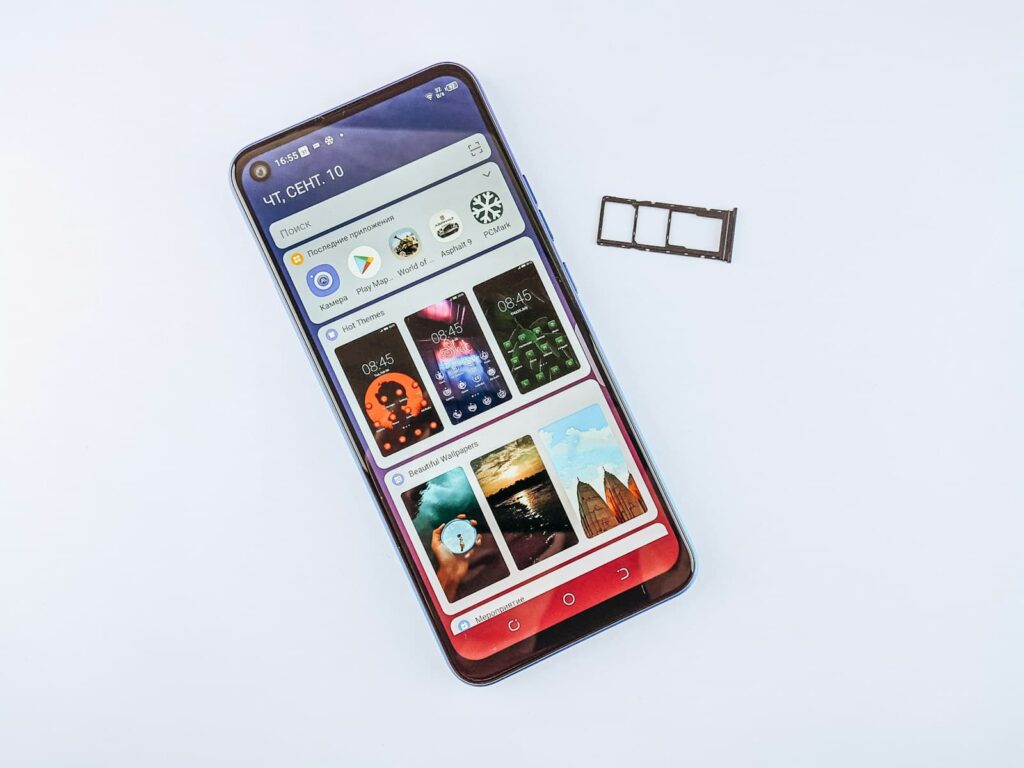 a cell phone sitting on top of a white table